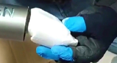 Parfüm şişesine uyuşturucu gizlemişler